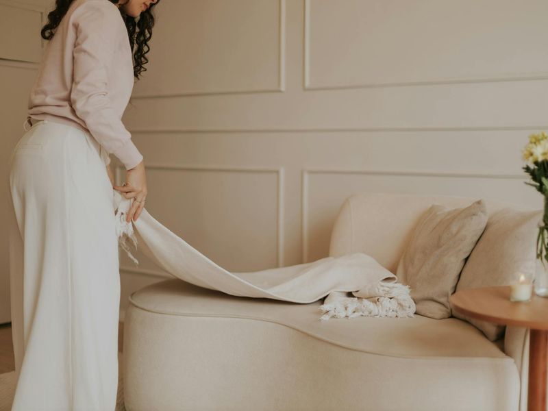Person doing light cardio in minimalist living room
