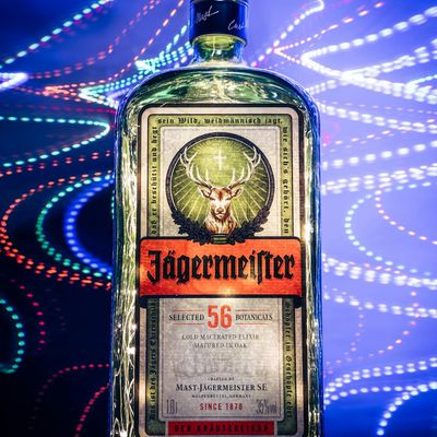 Water bottle on a neon green surface